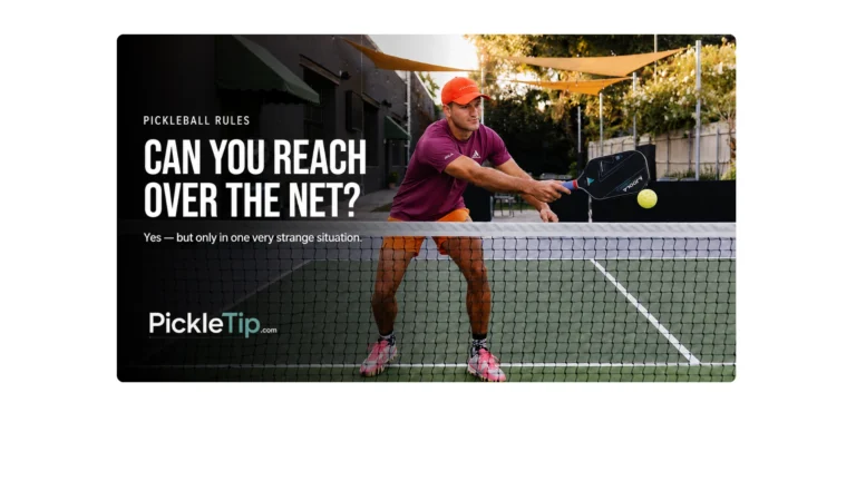 Coach AJ at The Exchange NOLA reaching over the pickleball net to demonstrate the rare wind rule exception.