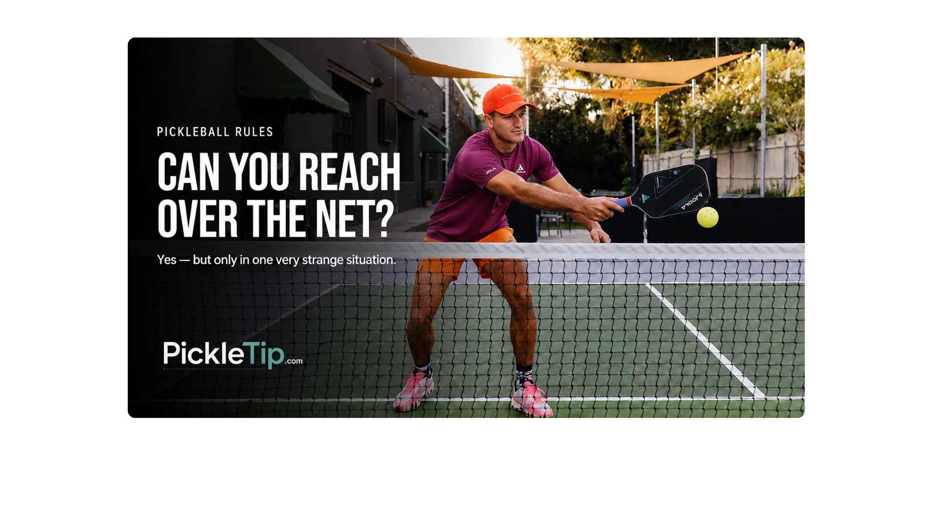 Coach AJ at The Exchange NOLA reaching over the pickleball net to demonstrate the rare wind rule exception.