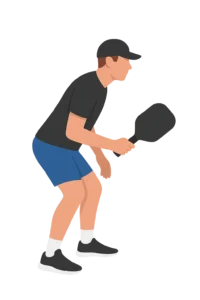 Pickleball ready position at the kitchen line