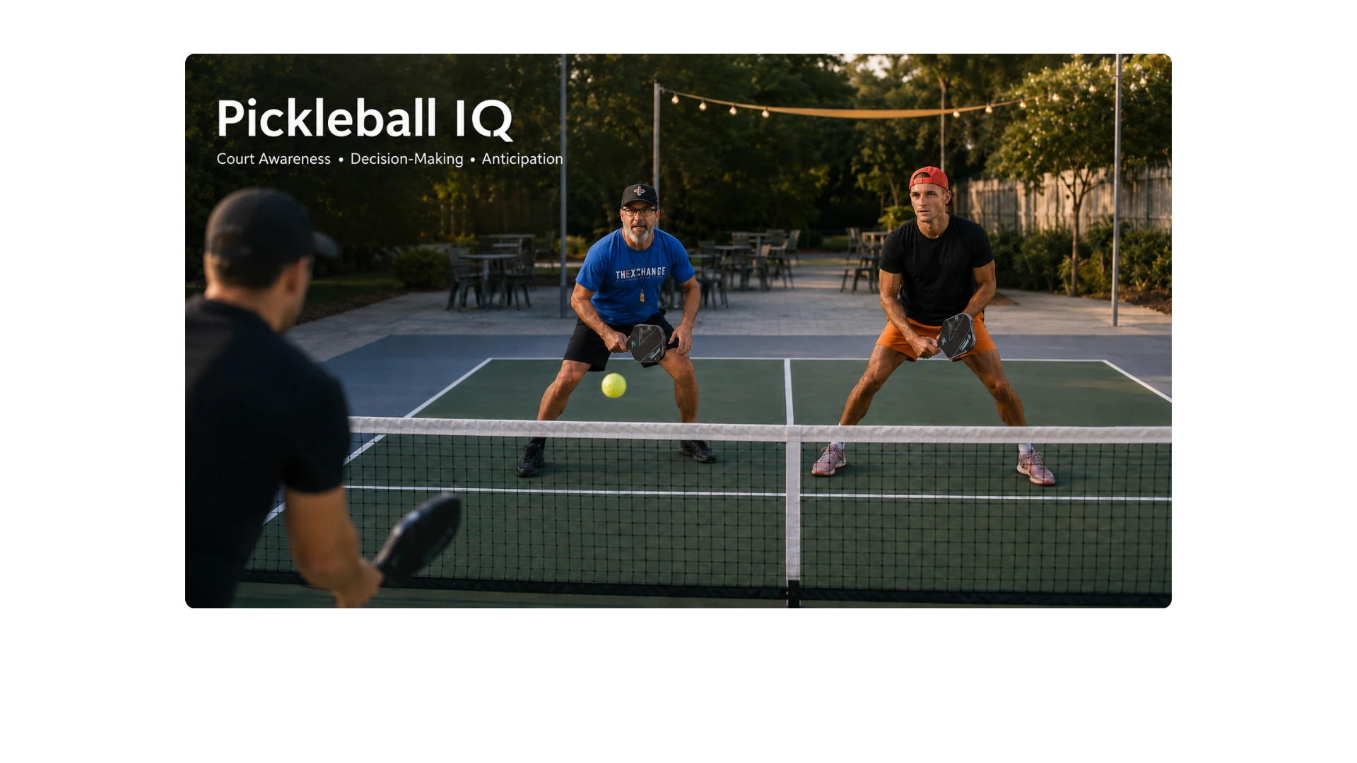 Coach Sid and Coach AJ reading the court together during a pickleball point