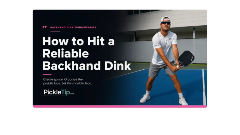 Coach AJ preparing to hit a two-handed backhand dink at the kitchen line