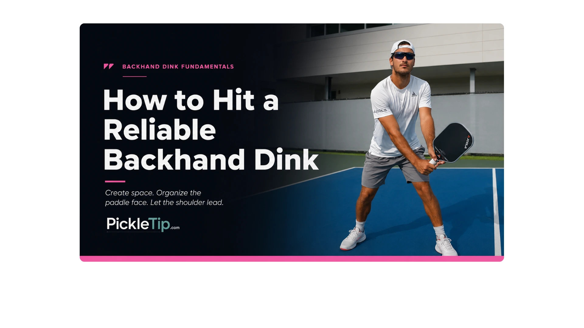 Coach AJ preparing to hit a two-handed backhand dink at the kitchen line
