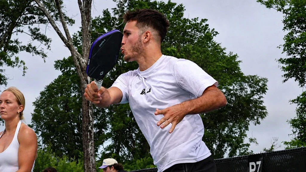AJ Parfait reacting under pressure during a competitive pickleball point at the Hattiesburg Moneyball tournament.