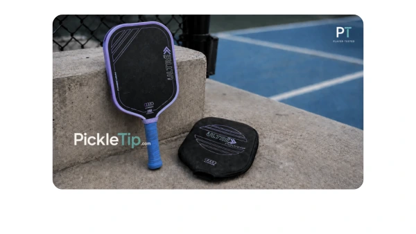 Player-tested 11SIX24 Ultre Power 2 paddle and cover beside a pickleball court