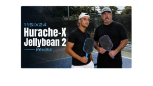Coach AJ and Coach Sid holding 11SIX24 Hurache-X Jelly Bean 2 pickleball paddles on a pickleball court