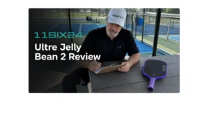 Coach Sid writing notes after testing the 11SIX24 Ultré Jelly Bean 2 pickleball paddle.
