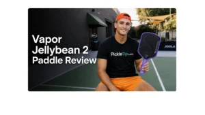 Coach AJ holding the 11SIX24 Vapor Jelly Bean 2 pickleball paddle