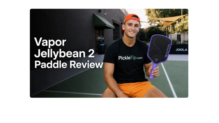 Coach AJ holding the 11SIX24 Vapor Jelly Bean 2 pickleball paddle