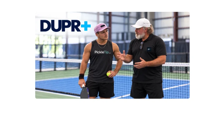 Coach Sid and Coach AJ discussing DUPR Plus beside an indoor pickleball court, with the DUPR+ logo overhead.