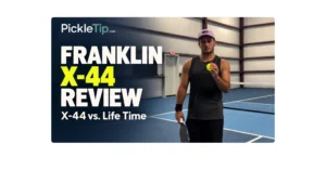 AJ holding a yellow Franklin X-44 pickleball on an indoor court beside the text “Franklin X-44 Review: X-44 vs. Life Time.”